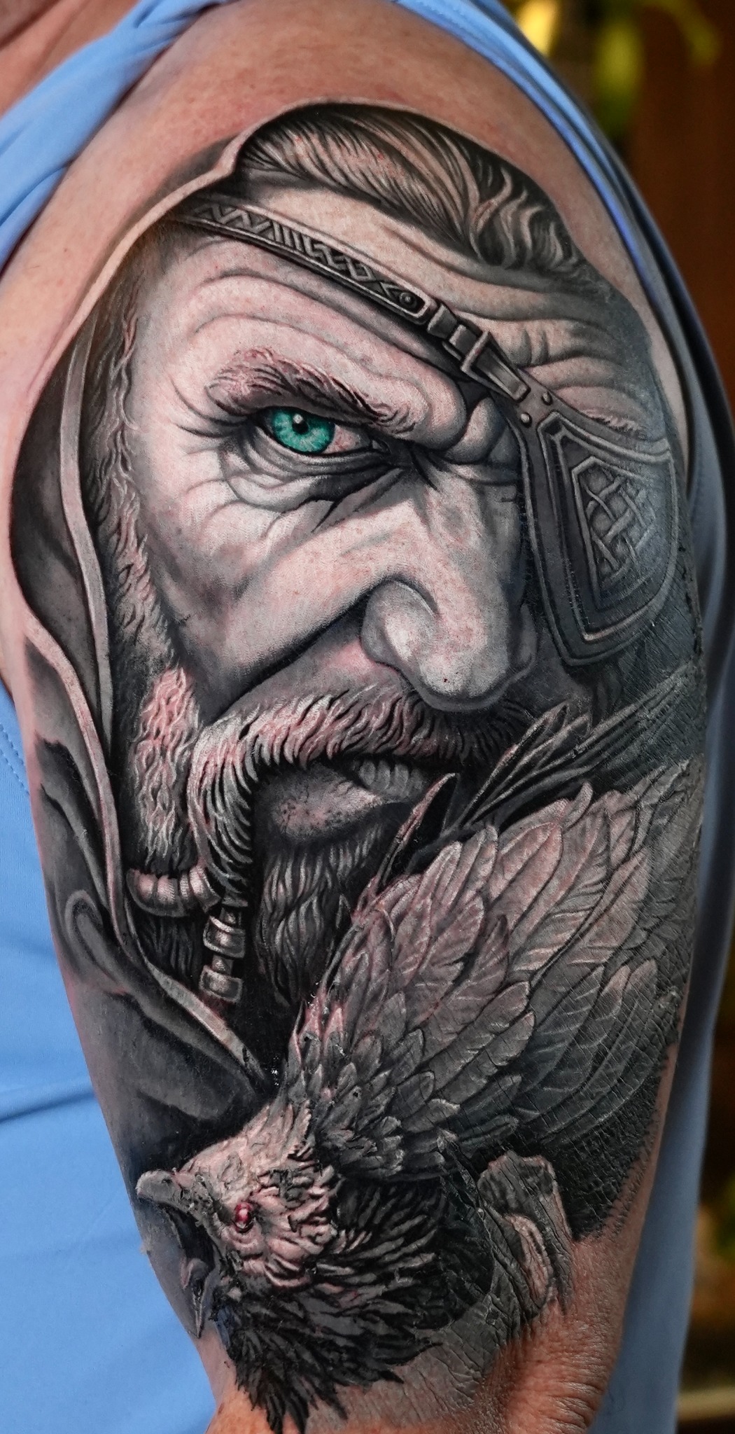 Grey featured tattoo 4 — Viking portrait and raven