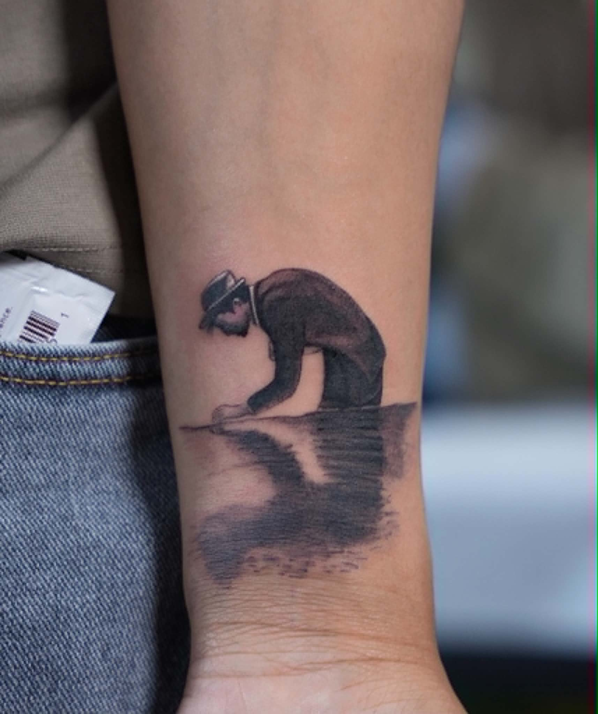 Soho featured tattoo 3 — reflective figure