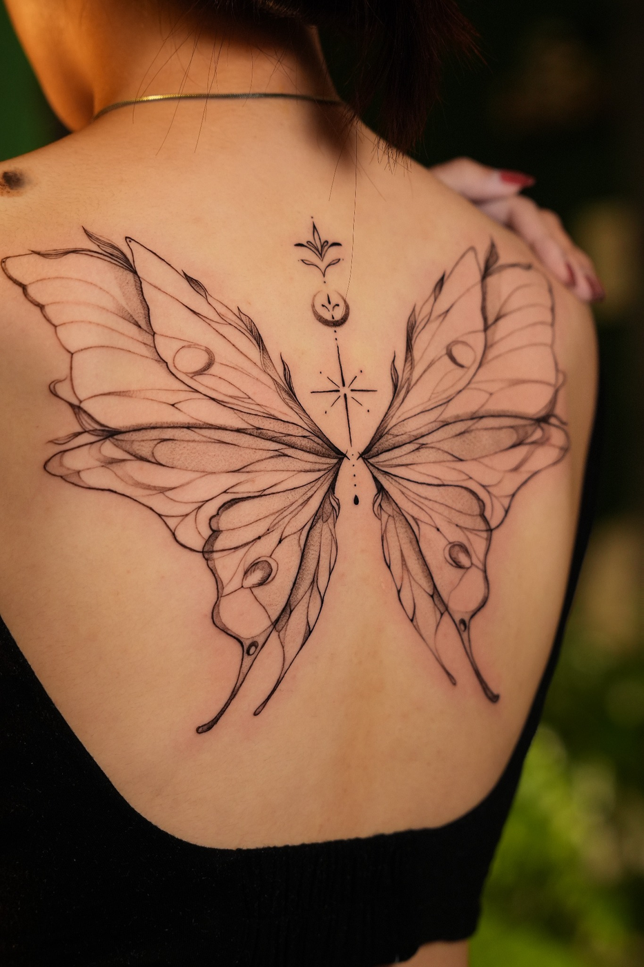 Yoko featured tattoo 1 — butterfly back piece