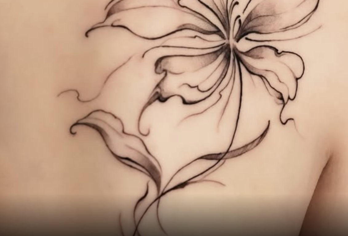 Yoko featured tattoo — fine-line flower